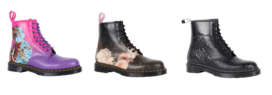 Three Dr. Martens boots from the 2018 collaboration; the black boot on the right carries the Unknown Pleasures ridges